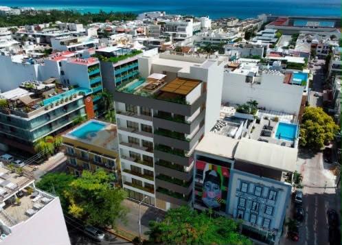 Local comercial de 206 m2 en preventa dentro del desarrollo Distrito Playa en Playa del Carmen, zona Av. 10. Entrega en diciembre 2026.